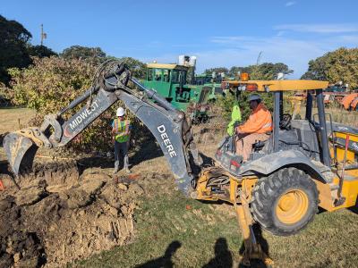 digging fiber connection point between plowed and bored fiber optic